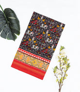 Black Handloom Ikat Silk Saree With Contrast Red Border