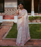 Cream Woven Organza Silk Saree With Embroidered Floral Motifs