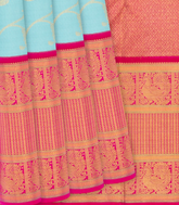 Turquoise Handloom Kanchipuram Korvai Silk Saree With Floral Zari Motifs -Turquoise