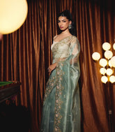Turquoise Woven Organza Saree With Embroidered Mirror Work & Floral Motifs-EN1809
