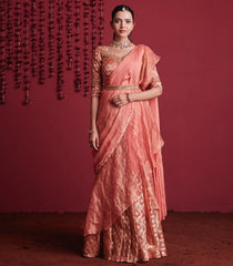 Pastel peach silk brocade pre-stitched saree skirt set