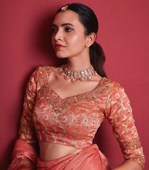 Pastel peach silk brocade pre-stitched saree skirt set