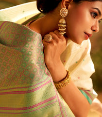 White Handloom Lino Silk Saree With Meena Buttas