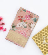 Light Peach Georgette Silk Saree Printed With Floral Motifs & Zari Border