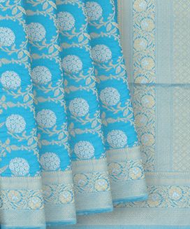 Turquoise Woven Blended Dupion Saree With Floral Vine Motifs
