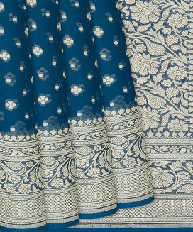 Peacock Blue Handloom Banarasi Khaddi Georgette Saree With Floral Motifs
