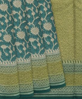 Teal Handwoven Chanderi Silk Cotton Saree With Floral Motifs
