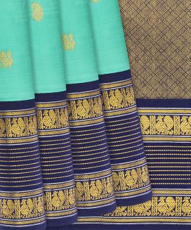 Turquoise Handloom Kanchipuram Korvai Silk Saree With Annam Motifs
