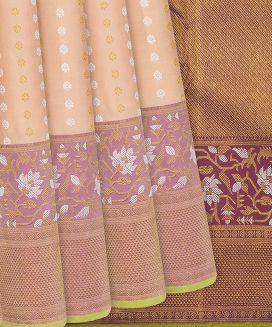 Light Peach Handwoven Kanchipuram Silk Saree With Floral Motifs
