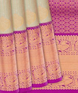 Beige Woven Silk Saree With Floral Motifs
