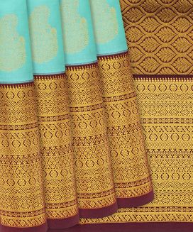 Turquoise Woven Silk Saree With Mango Motifs

