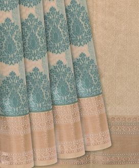 Beige Woven Chanderi Cotton Saree With Cyan Floral Butta Motifs
