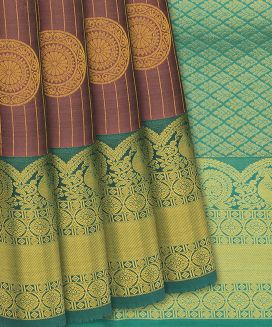 Brown Woven Silk Saree With Chakaram Motifs
