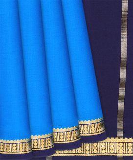 Light Blue Mysore Plain Crepe Silk Saree With Contrast Pallu
