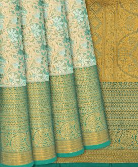 Cyan Handloom Kanchipuram Tissue Silk Saree With Vine Motifs
