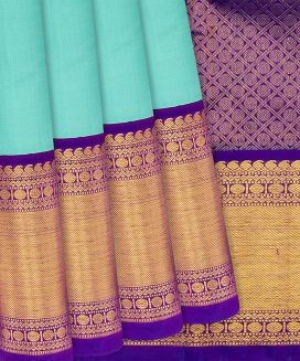 Turquoise Handloom Kanchipuram Korvai Silk Saree With Purple Border
