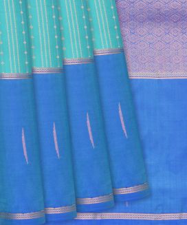 Turquoise  Kanchipuram Silk Saree With contrast cyan border & pallu
