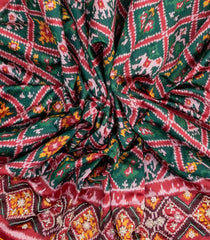 Dark Green Blended Silk Saree With Ikat Motifs & Hand Embroidered Selvage-EN1708
