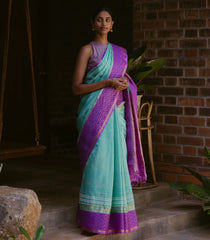 Turquoise Handloom Chirala Silk Cotton Saree With Handknotted traditional motifs above the border