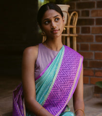 Turquoise Handloom Chirala Silk Cotton Saree With Handknotted traditional motifs above the border