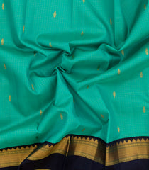 Turquoise Handloom Korvai Kanchipuram Silk Saree With Checks & Buttas-KA13809