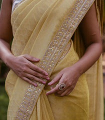 Mustard Woven Tissue Emboss Embroidery Saree