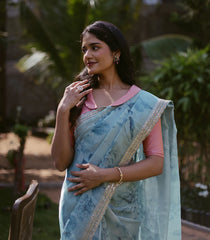 Turquoise Woven Organza Printed Saree With Embroidered Border