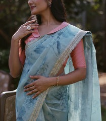 Turquoise Woven Organza Printed Saree With Embroidered Border