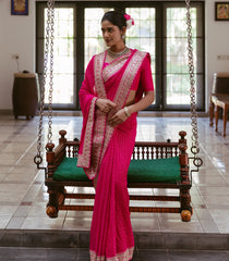 Pink Woven Georgette Saree With Floral Embroidery