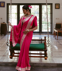 Pink Woven Georgette Saree With Floral Embroidery