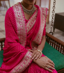 Pink Woven Georgette Saree With Floral Embroidery