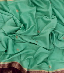 Aquamarine Woven Art Crepe  Saree With Stone Work In Contrast Border-BL5145
