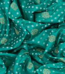 Turquoise Handloom Banarasi Silk Saree With Floral & Corner Paisley Motifs-Turquoise