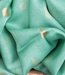 Turquoise Handwoven Banarasi Organza Saree With Floral Buttas-Turquoise