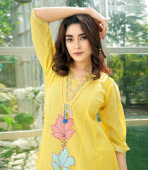 Yellow floral kurta set with matching dupatta and dhoti pants