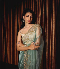 Turquoise Woven Organza Saree With Embroidered Mirror Work & Floral Motifs-EN1809