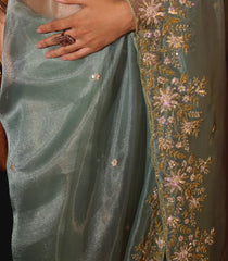 Turquoise Woven Organza Saree With Embroidered Mirror Work & Floral Motifs-EN1809