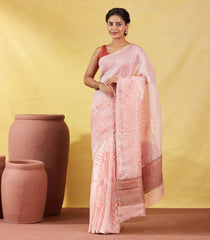 Peach Handwoven Linen Saree Printed With Flower Motifs