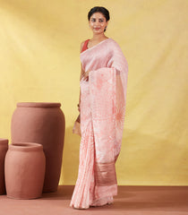 Peach Handwoven Linen Saree Printed With Flower Motifs