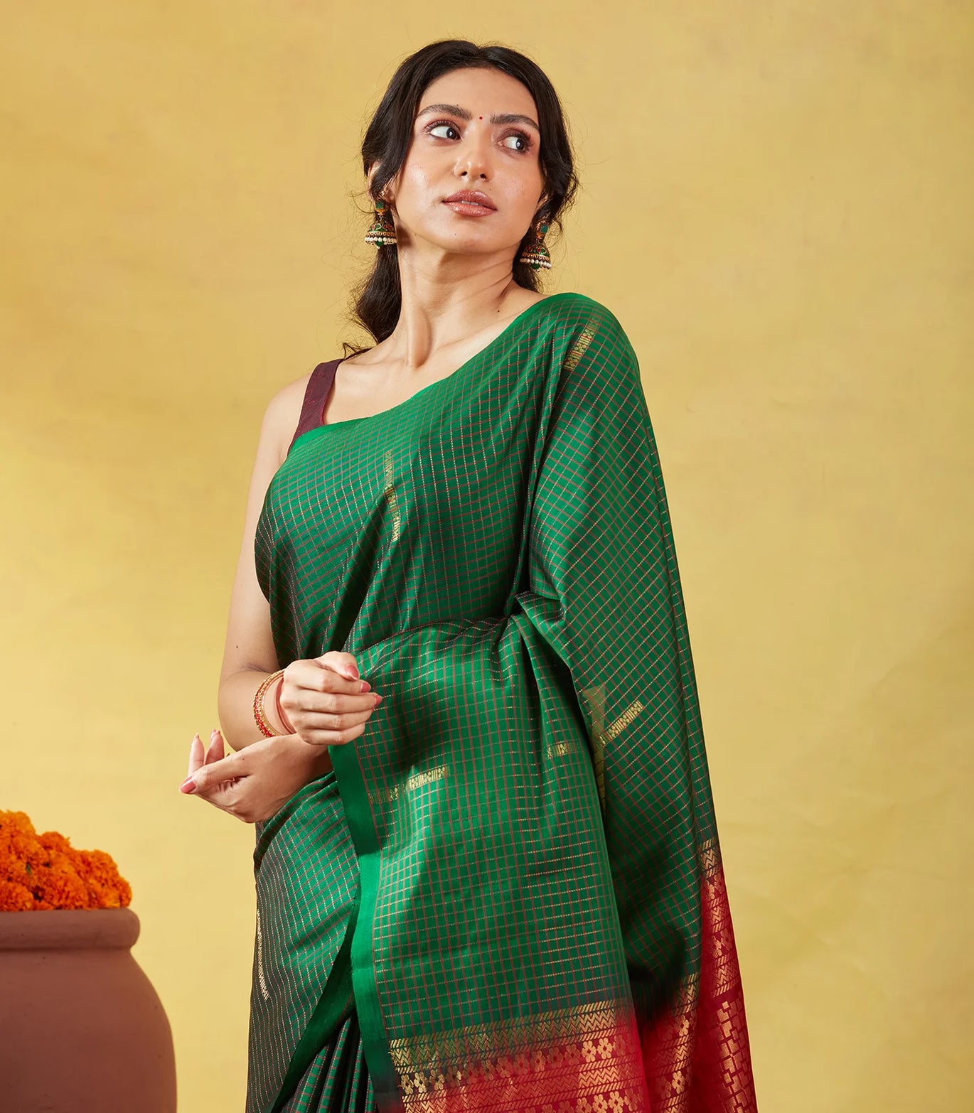 Leaf-green pure store handloom soft silk saree with golden zari buttas