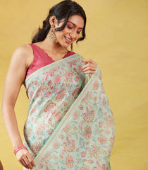 Turquoise Handwoven Linen Saree Printed With Floral Motifs