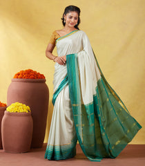 Light Green Mysore Plain Crepe Silk Saree With Contrast Green Border