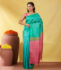 Aquamarine Soft Silk Saree With Floral Zari Motifs & Contrast Pallu