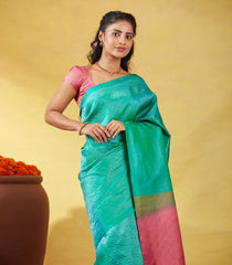 Aquamarine Soft Silk Saree With Floral Zari Motifs & Contrast Pallu