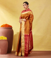 Mustard Soft Silk Saree With Stripes And Geometric Buttas