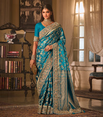Cyan Woven Blended Satin Saree With Floral Zari Motifs & Hand Theme Heavy Embroidery-EN2128
