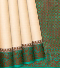 Cream Handwoven Tussar Silk Saree With Floral Motifs In Contrast Border-Cream