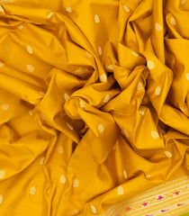 Mustard Handwoven Banarasi Silk Saree With Floral Motifs