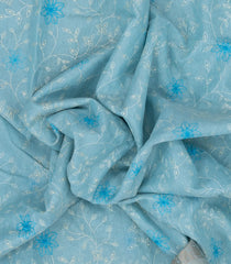 Turquoise Woven Linen Saree With Embroidered Floral Motifs-LI0633