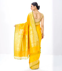 Mustard Handwoven Banarasi Silk Saree With Floral Motifs & Corner Buttas